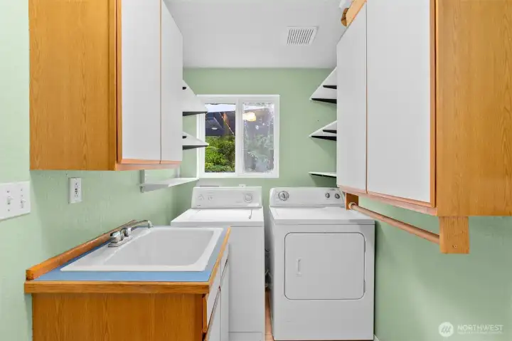 Laundry with storage-washer and dryer stay