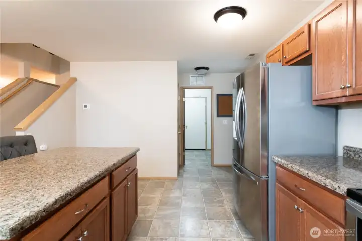 Kitchen leads to laundry room