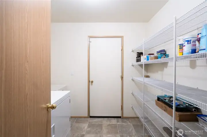 large laundry room with extra storage