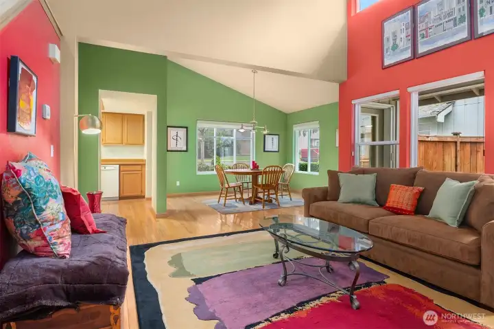 Living Room with Hardwood Floors & Vaulted Ceiling