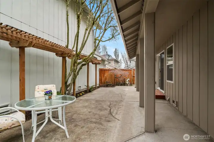 Private Patio with Perennial Garden & Access to 2 Car Garage