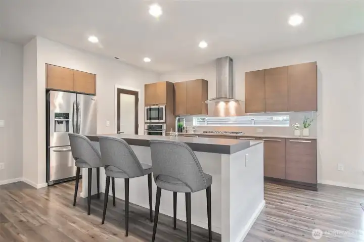 Kitchen view 1 - virtual staging with bar chairs