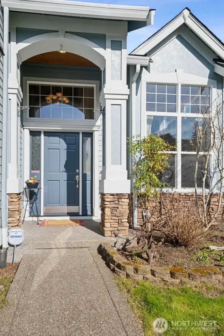 A newer roof installed in 2018 provides peace of mind for years to come. The home’s exterior has been meticulously maintained, reflecting pride of ownership. Every detail contributes to long-term durability and appeal.