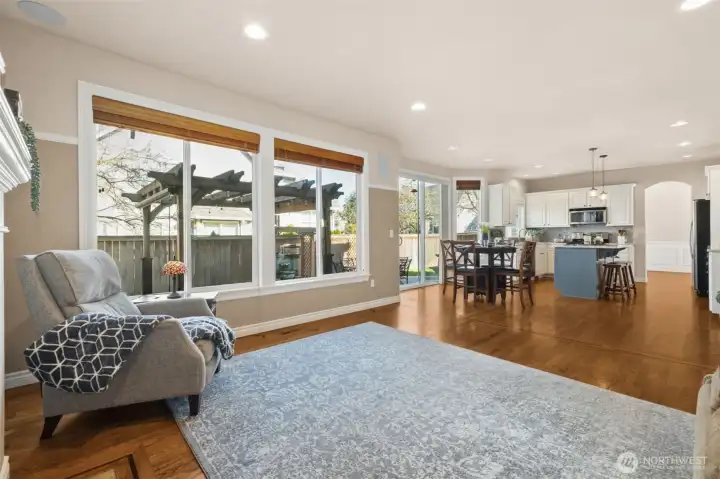 The kitchen’s seamless flow into the family room makes entertaining effortless. Guests can mingle while meals are prepared, keeping everyone part of the moment. It’s a layout designed for connection. A large pantry provides exceptional storage, keeping the kitchen organized and efficient. Everything has its place, making meal prep a breeze. It’s a feature every home cook will appreciate.