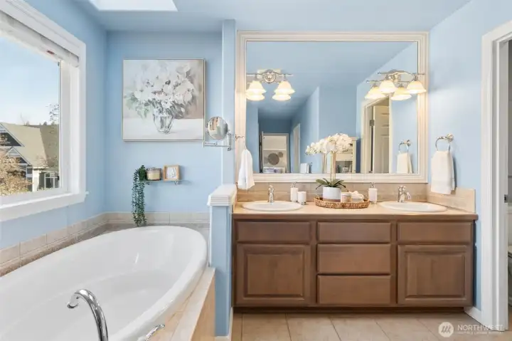 The five-piece En suite bath offers a spa-like experience with a soaking tub and separate shower. Quality finishes elevate the space into a relaxing sanctuary. It’s a place to unwind and recharge.