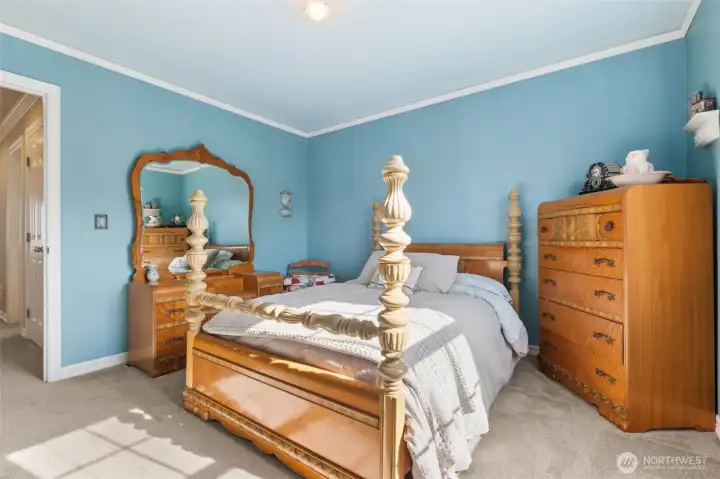 Bedroom #2 with soft carpet underfoot.