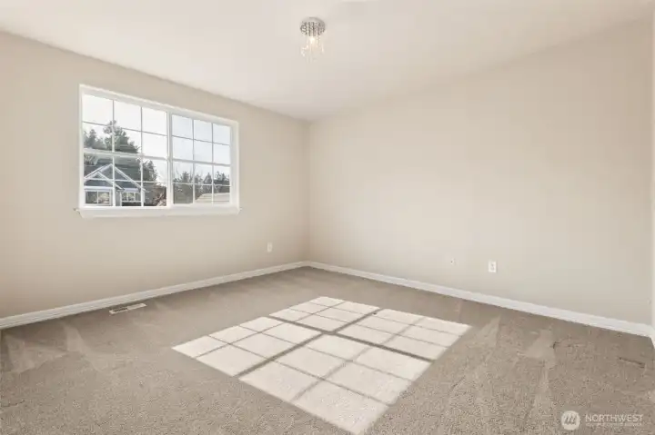 Bedroom #3. Secondary bedrooms are bright, comfortable, and well-proportioned. Each room offers flexibility and are designed to meet a variety of needs.