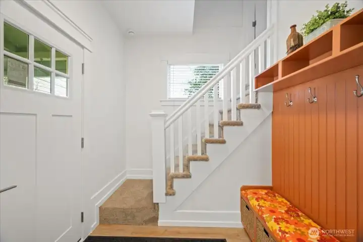 Step in to this adorable craftsman with built-in coat rack/bench