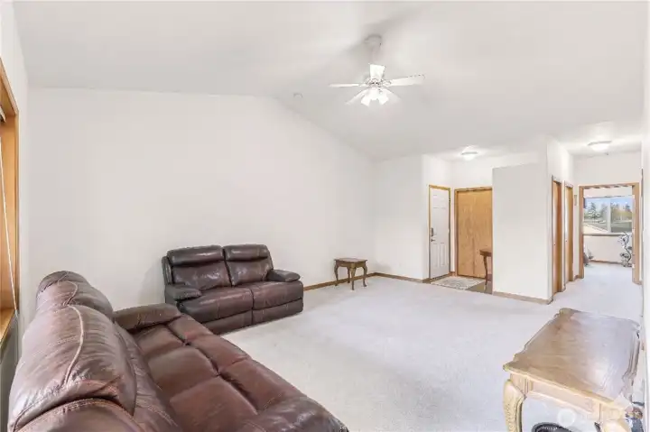 Bright Single-Level Living Room with Easy Flow to Dining Area - Virtually Decluttered