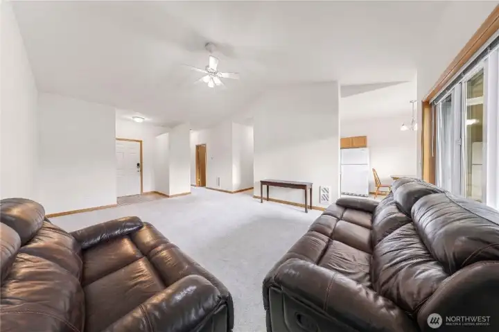 Expansive Living Space with Vaulted Ceiling - Virtually Decluttered