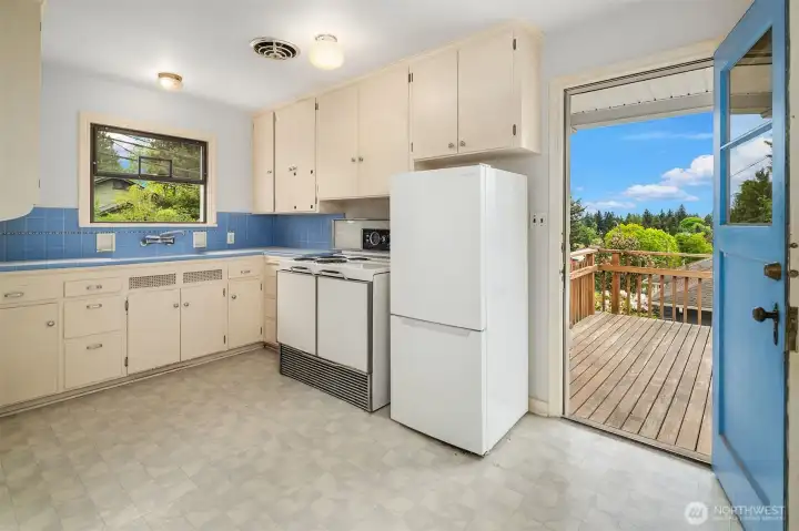 Kitchen with access to back deck
