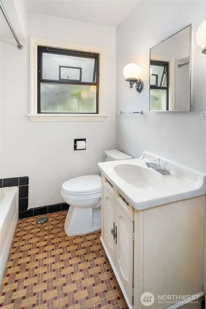 Full bath with vintage tile (main floor)