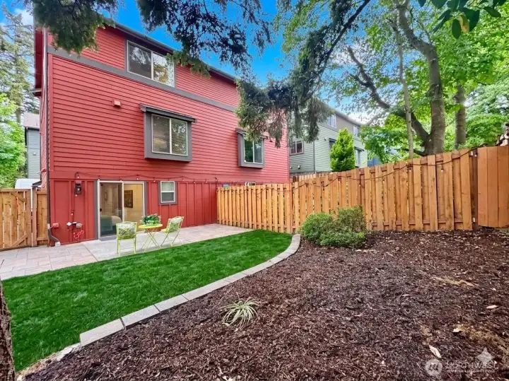 Private fenced backyard w/ greenspace. Private fenced backyard w/ greenspace.