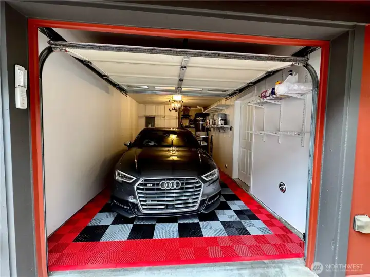 New RaceDeck free flow garage flooring in attached garage + storage area. New RaceDeck free flow garage flooring in attached garage + storage area.