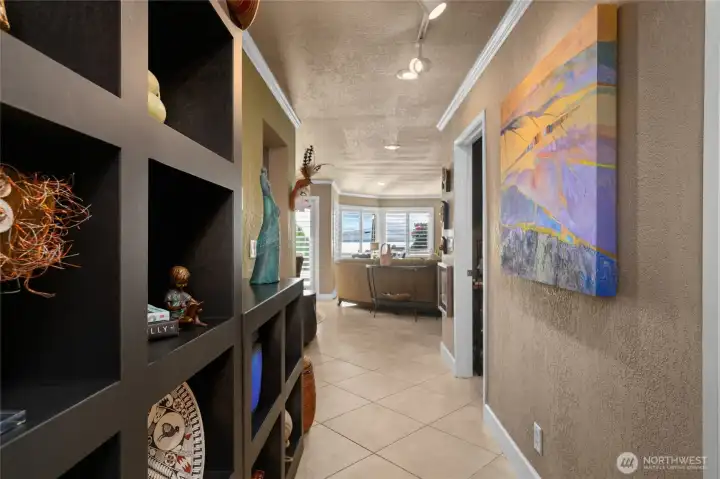Hallway leading to living area, kitchen and dining