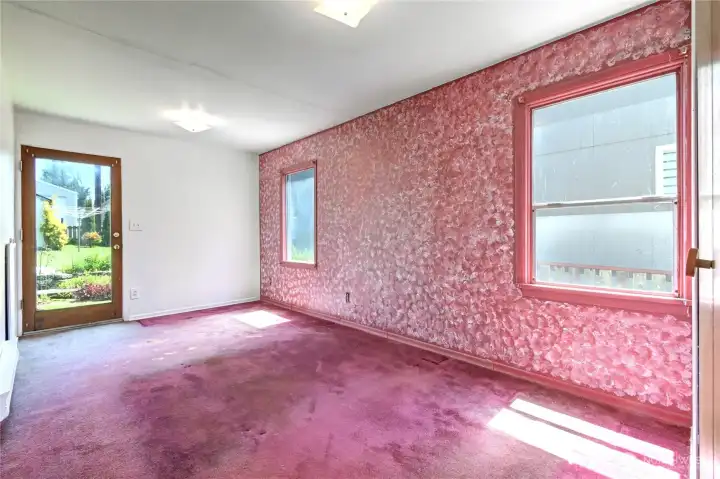 Primary Bedroom with access to backyard.