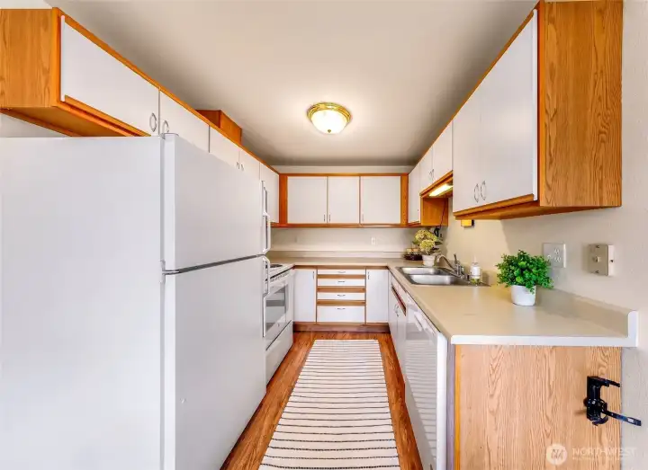 Kitchen with ample cabinetry and timeless wood trim