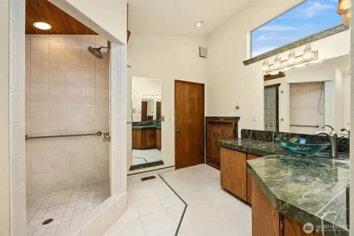 Remodeled bathroom with granite countertops, walk-in double headed shower. Remodeled bathroom with granite countertops, walk-in double headed shower.