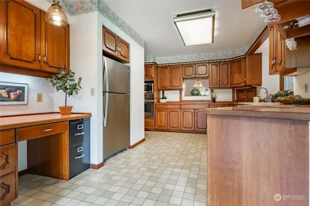 Kitchen has tons of space for storage and potential re-imagining