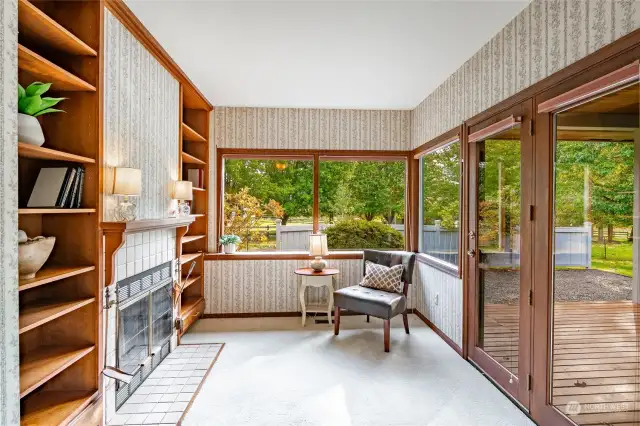 The fireside room in the primary has french door access to the covered deck