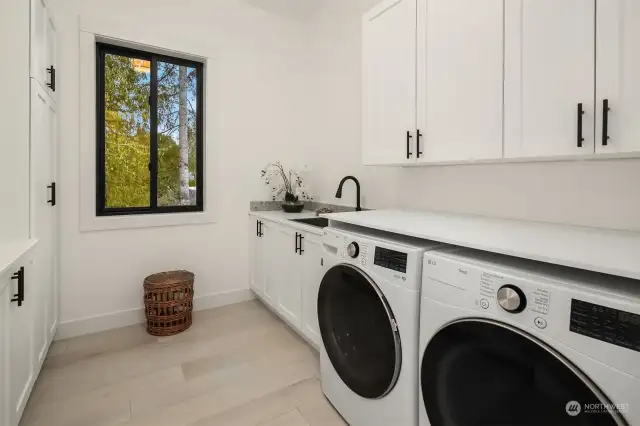 Laundry room with great folding counter space.