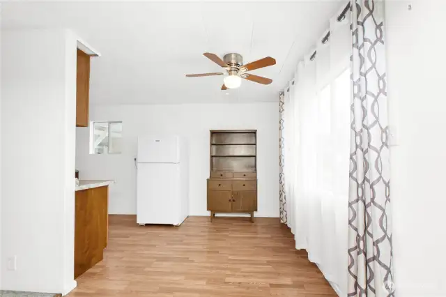 Eating area has nice laminate flooring running through to the kitchen, utility and bathroom.