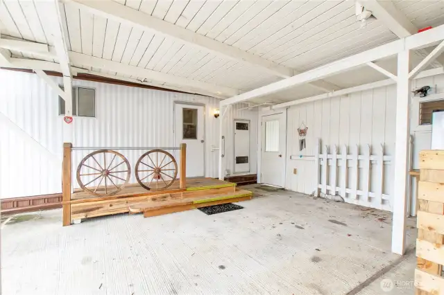 2 car carport has added room for storage.  The park maintains the carport and it is on the list to be repaired/replaced