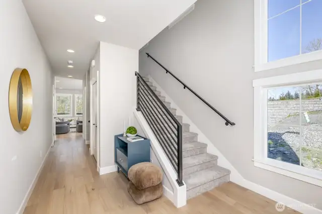All hardwoods on the main. Photo is of the staged model, the same 2,958 sf floor plan as the listed home.  Colors vary.