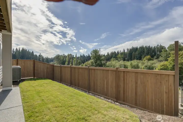 Enjoy rare unobstructed views of Evergreen trees and sunsets.