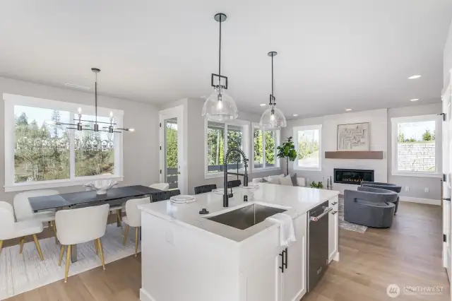 Gorgeous main floor with peaceful & rare territorial views of nature. Photo is of the staged model, the same 2,958 sf floor plan as the listed home.  Colors vary.