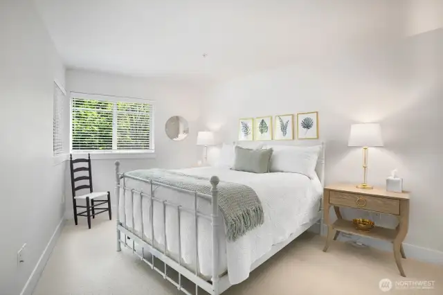 Comfortable Primary Bedroom with interesting angled walls and plenty of room.