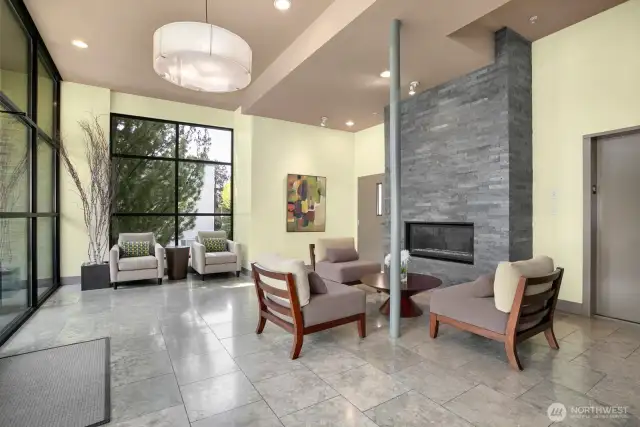 Secure lobby with fireplace. Elevator on the right. You can visit with friends and pick up your mail here.