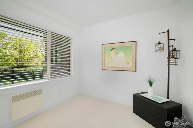 Office or extra room is off the living area. Window looks out to the yard and city views.
