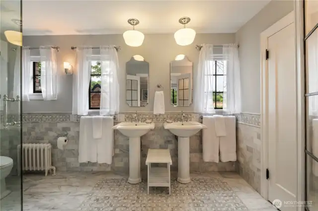Intricate Cararra Marble tile throughout primary bath