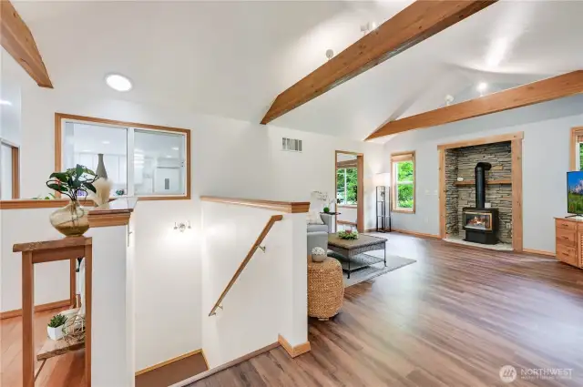 Between the foyer and the living room are the stairs down