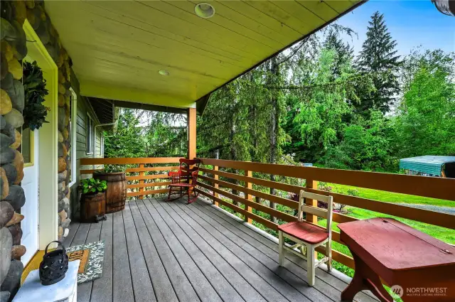 Covered front porch with easy care composite decking.