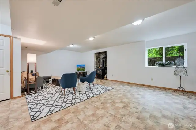 Family room downstairs has plenty of room for multiple entertainment options