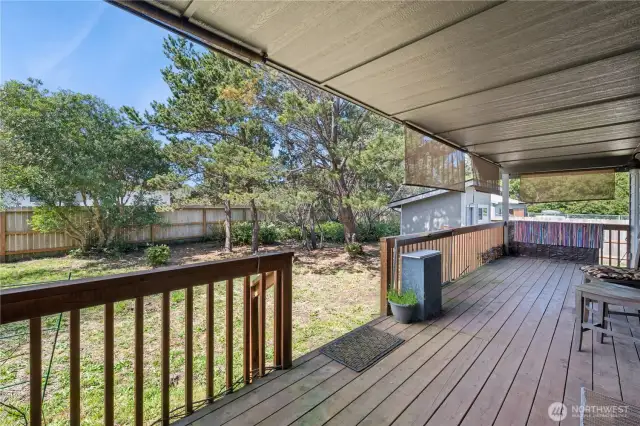 Back porch is the length of the home and is totally covered.