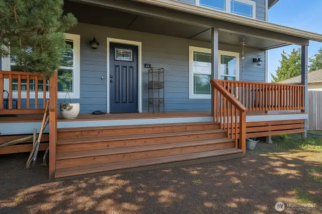 Covered porches on front and back. Both the length of the home!