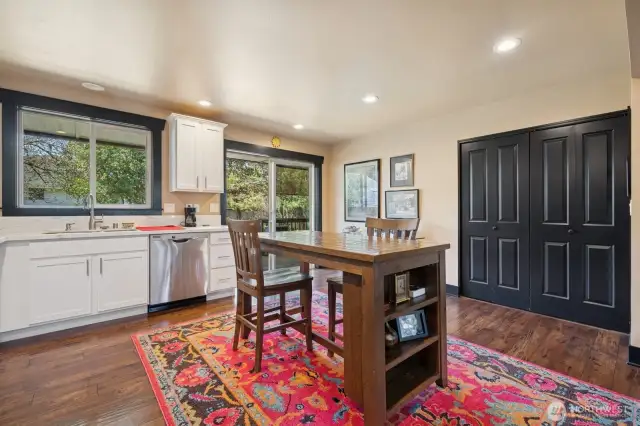 Washer and dryer conveniently hidden behind beautiful doors.