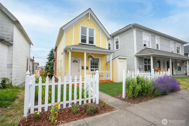 You'll enjoy this fully remodeled home featuring fresh landscaping, a brand-new front porch, and an adorable white picket fence!