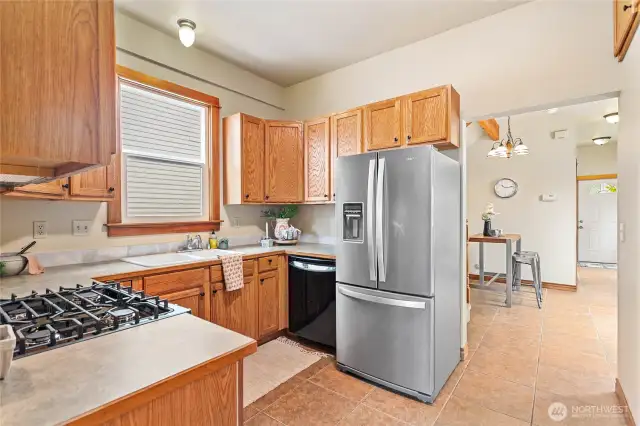 The kitchen opens up nicely to the dining area and living room — perfect for gatherings!