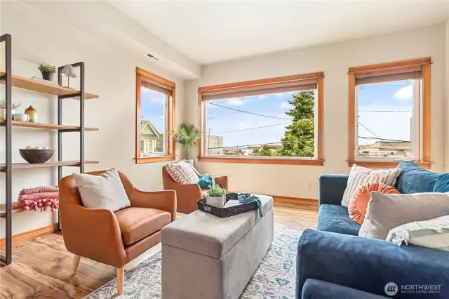 Fresh paint and newly cleaned windows fill the space with warm, natural light.