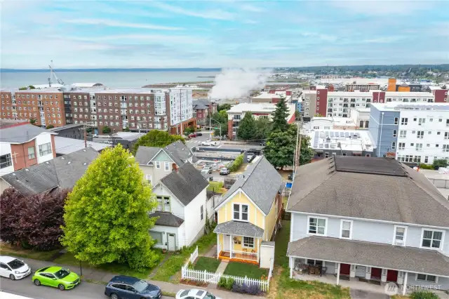 Aerial view highlighting proximity to Bellingham Bay, scenic walking trails, and beautiful new waterfront parks.