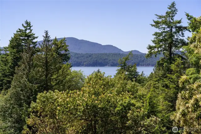 Perched amongst the trees with west-facing views of the sound, this Orcas Island sanctuary captures the essence of Pacific Northwest serenity