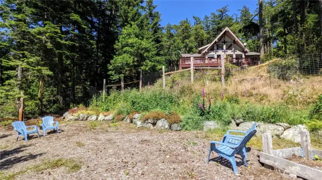 Enjoy your vibrant garden space and expansive outdoor living area ideal for entertaining, relaxing, and soaking in the natural beauty of Orcas Island