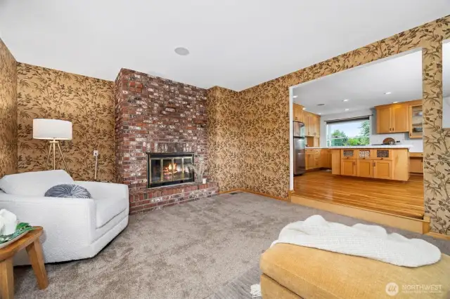 The living room room is open to the kitchen and dining room.