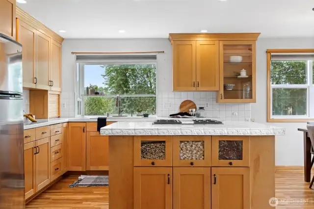 Looking at the kitchen with the large island with the gas range in it. The kitchen was updated a few years ago, and is very great.