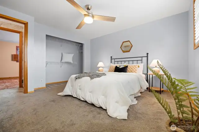 The primary bedroom is very spacious and has a large closet.
