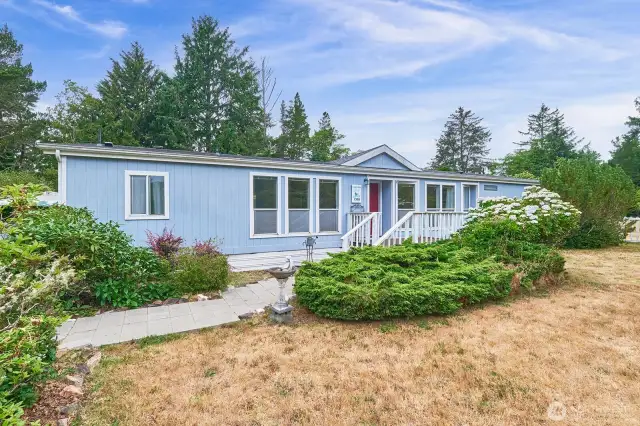 Spacious doublewide situated on a rare double lot—plenty of room to tinker, garden, and play.